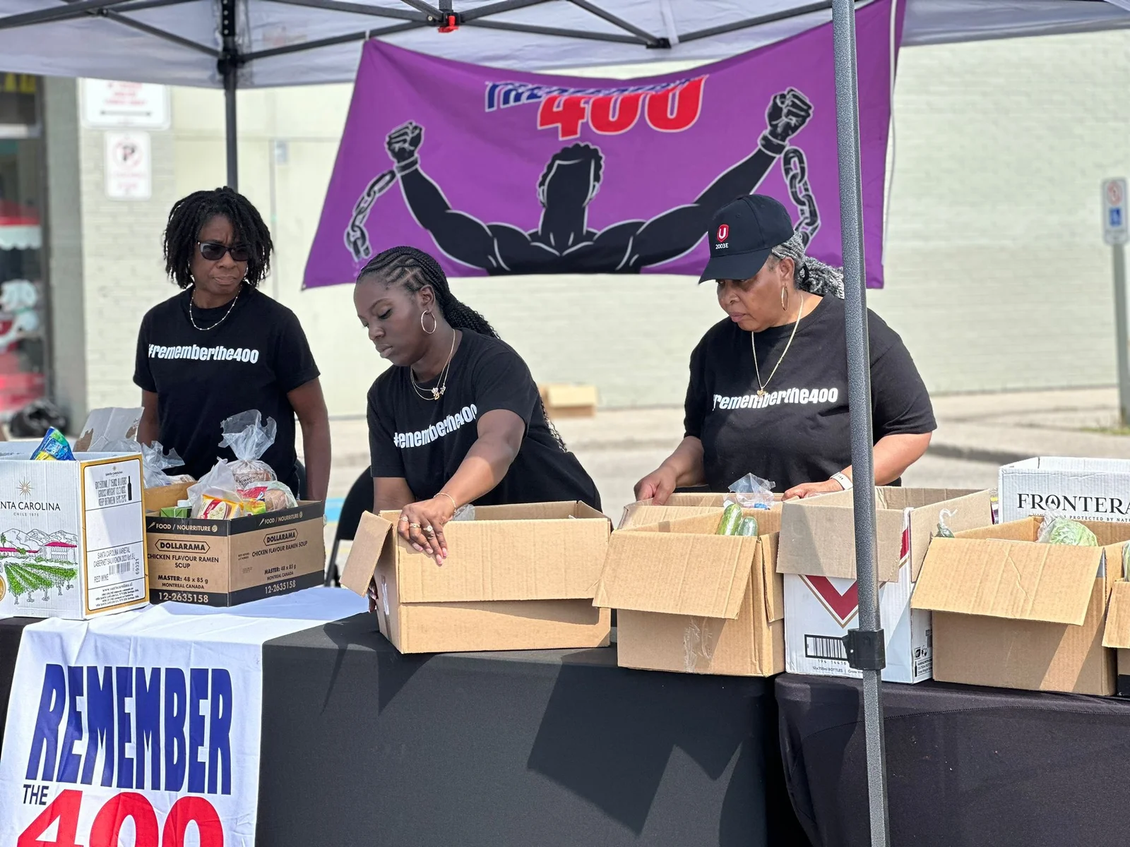 Volunteers assembling food boxes